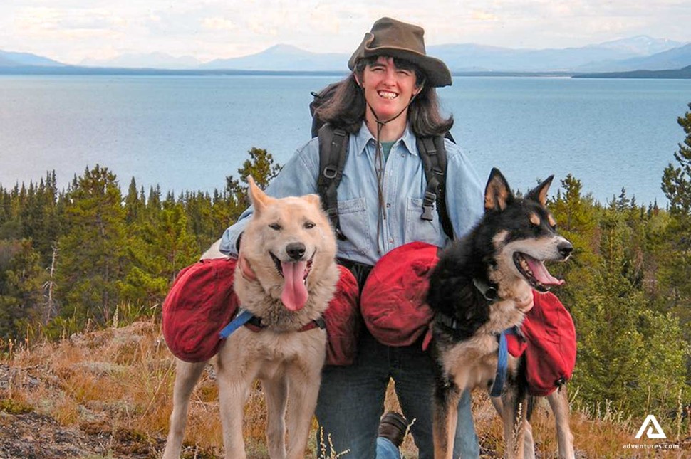 hiker with two dogs in canada