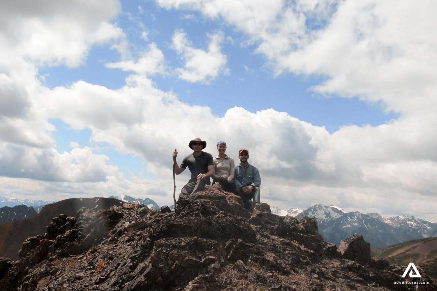 happy hikers on a mountain in canada