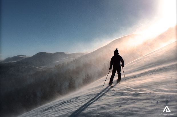 skiing down a foggy hill skiing down a foggy hill in winter