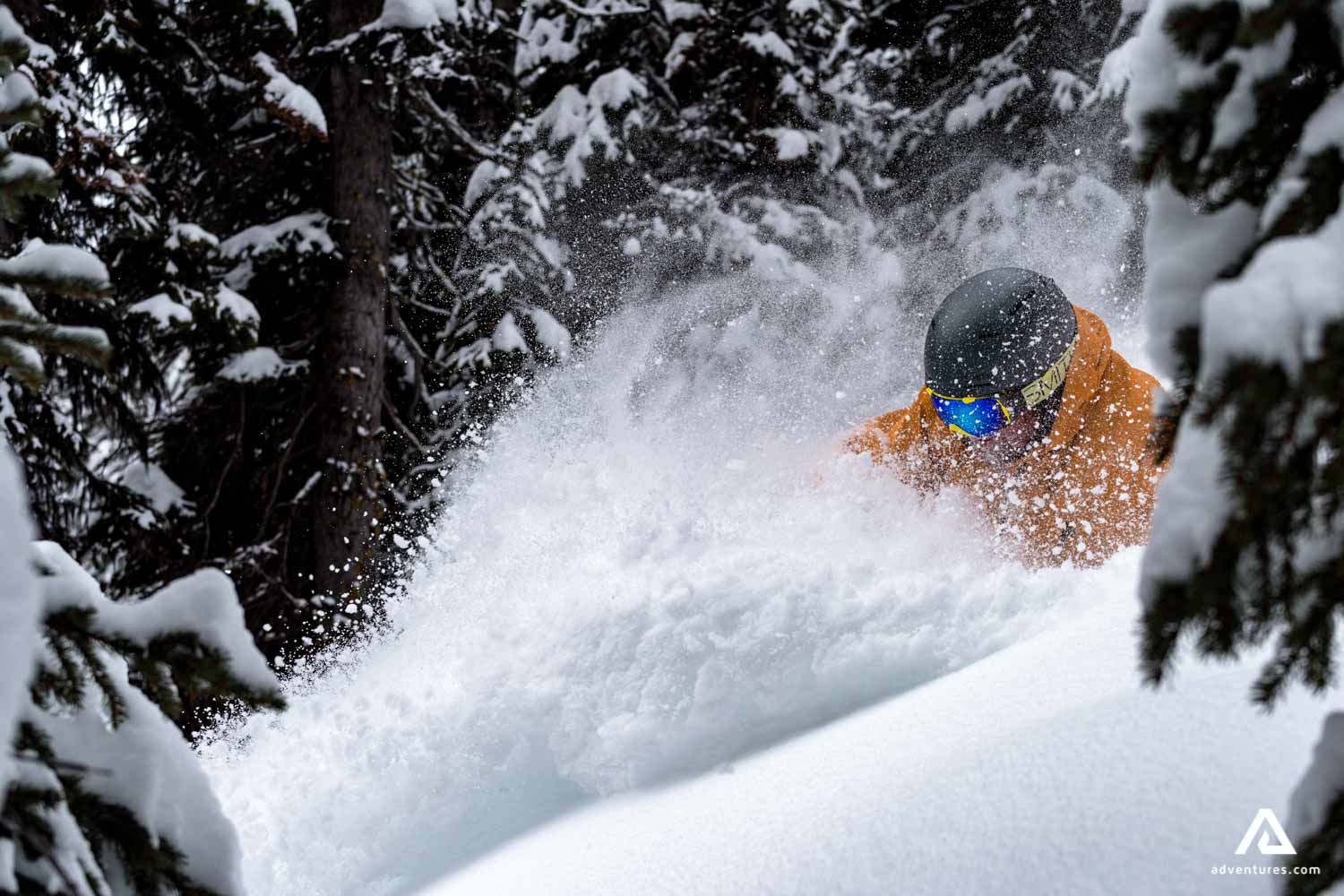 going down a snowy mountain in banff
