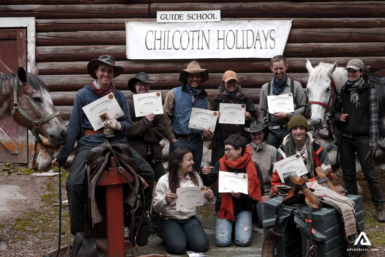 group with learning certificates in horseback riding