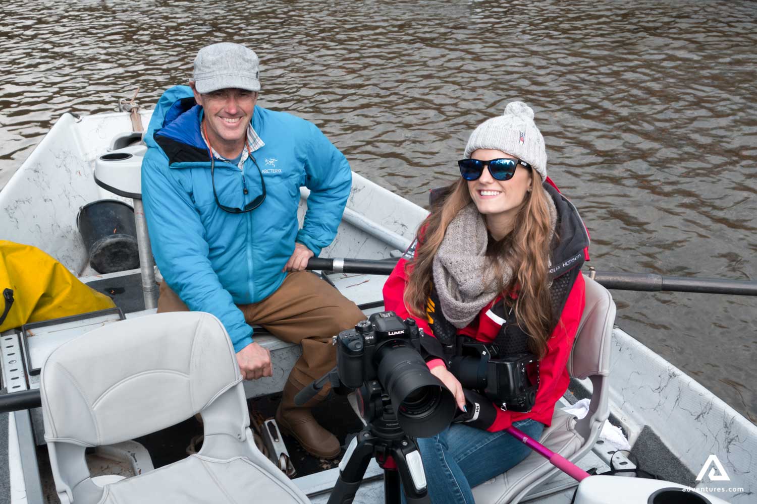happy couple in a boat in canada