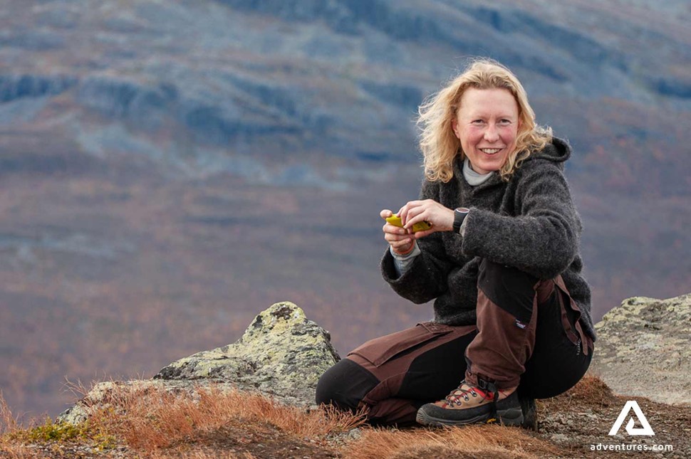 happy hiker woman in sark national park in sweden