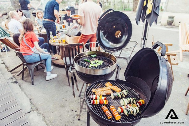 cooking food in a barbecue grill in lithuania
