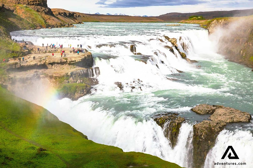 gullfoss waterfall view with a rainbow in summer