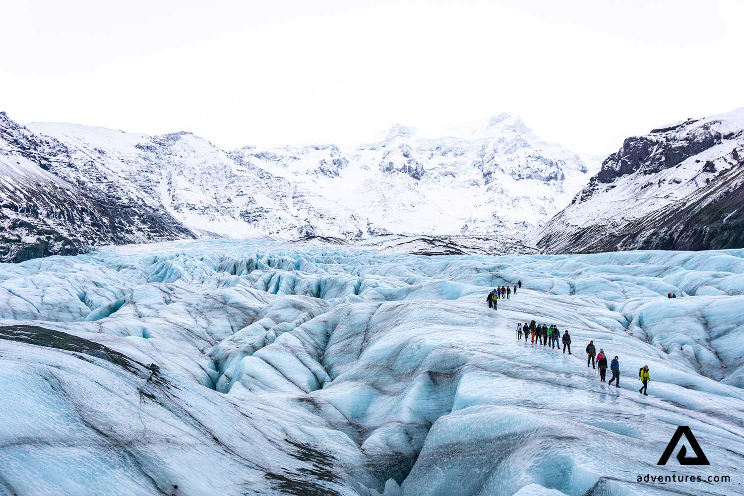 two groups hiking on svinafellsjokull glacier
