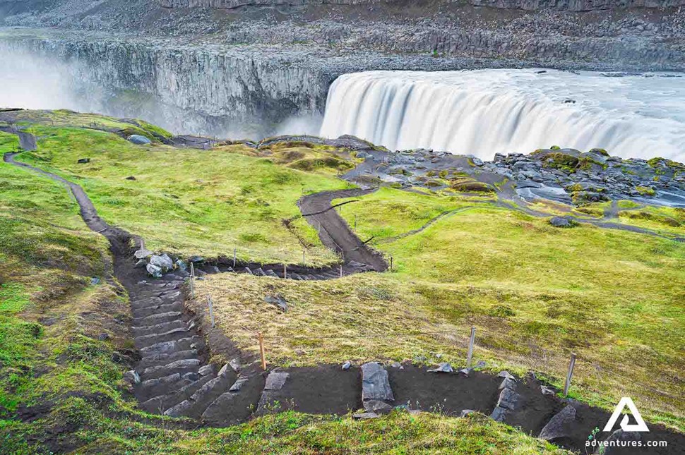 small gravel path leading to dettifoss waterfall