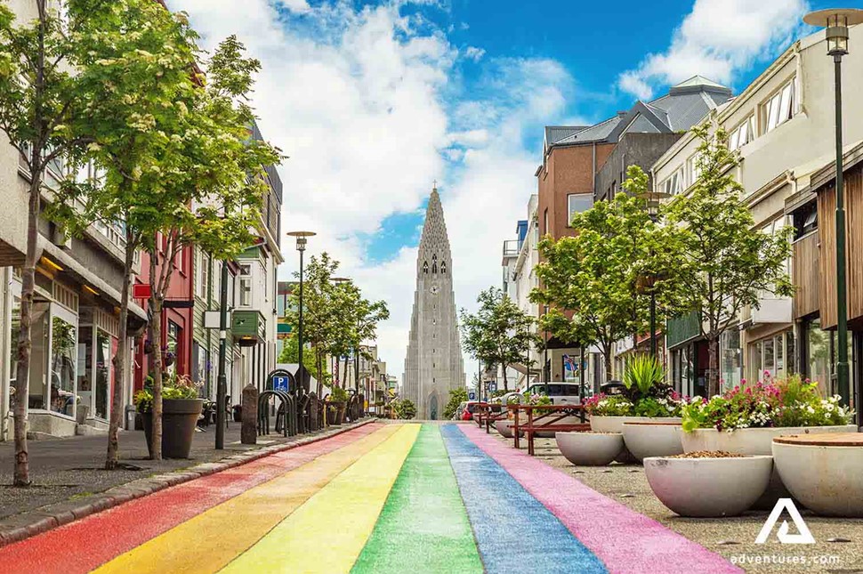 rainbow painted street leading to hallgrimskirkja church