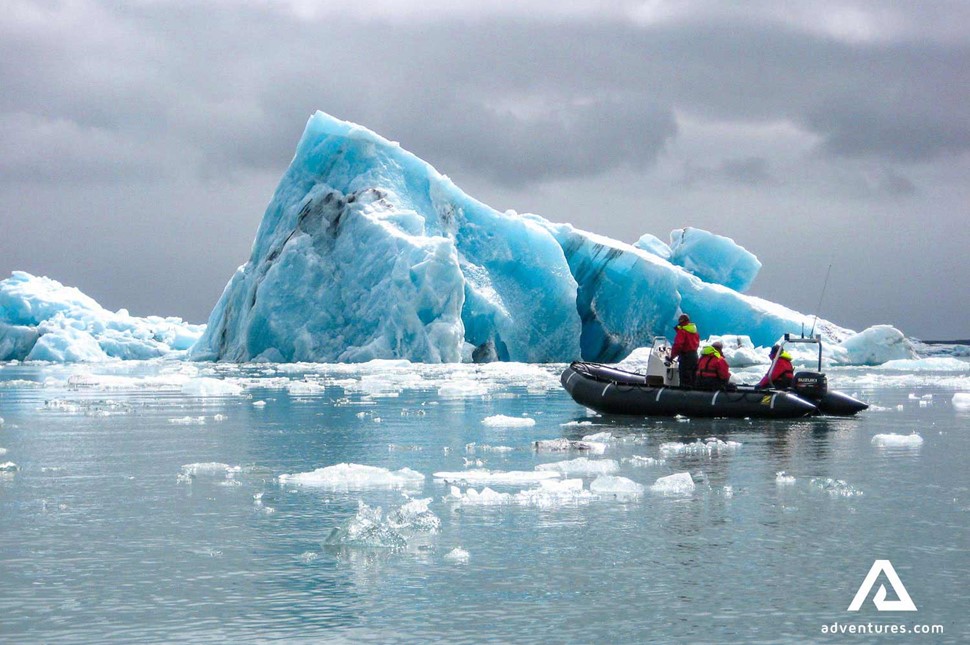 small group in a zodiac boat in jokulsarlon