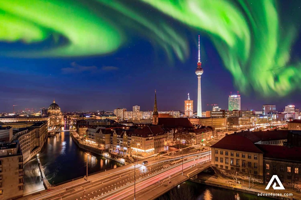 aurora borealis above berlin city in germany