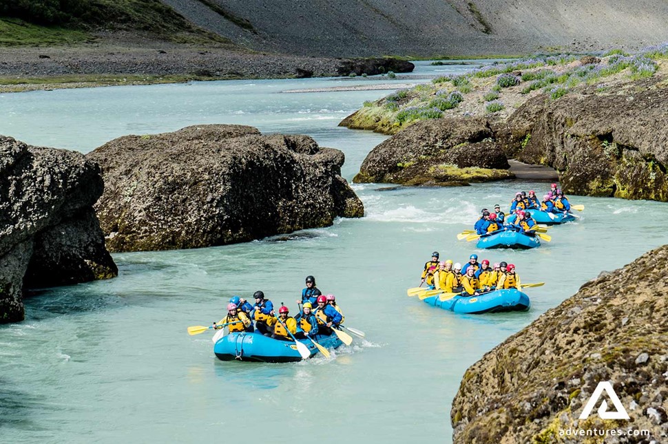 small groups rafting in hvita river in iceland