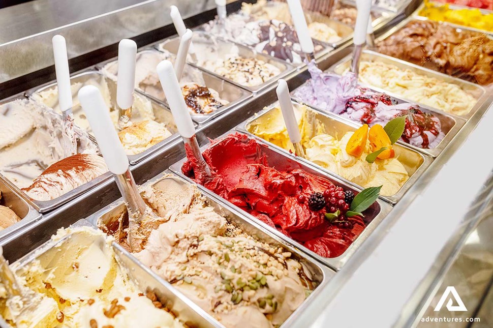 a wide selection of ice cream at a shop