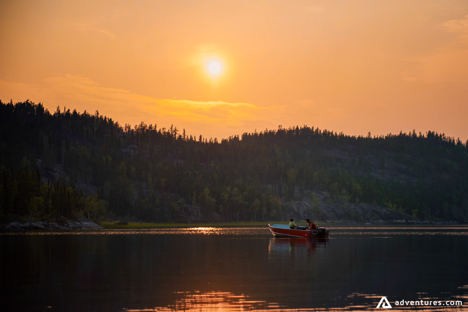 Fishing boat at sunset
