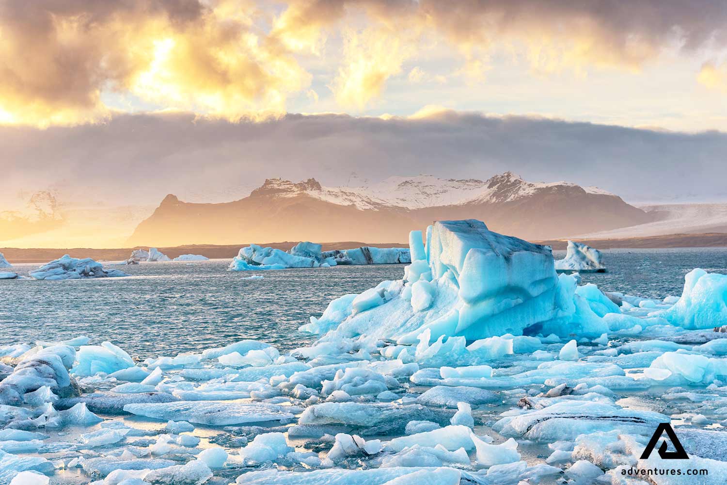 Midnight sun over Jokulsarlon iceberg available as Framed Prints