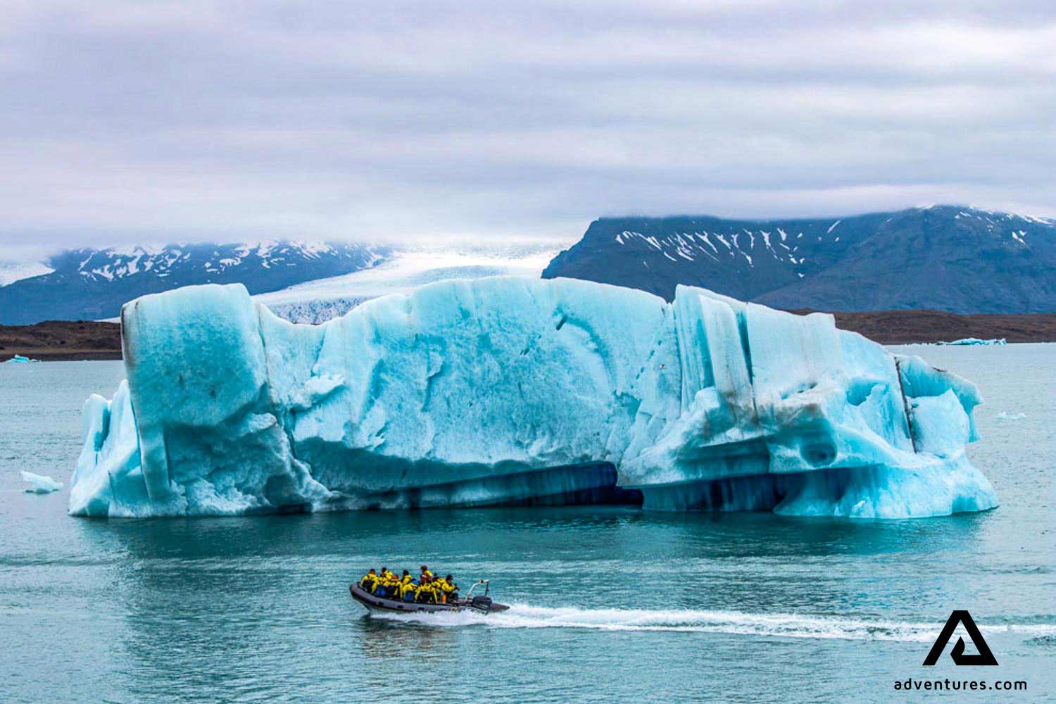 people on a boat tour in jokulsarlon