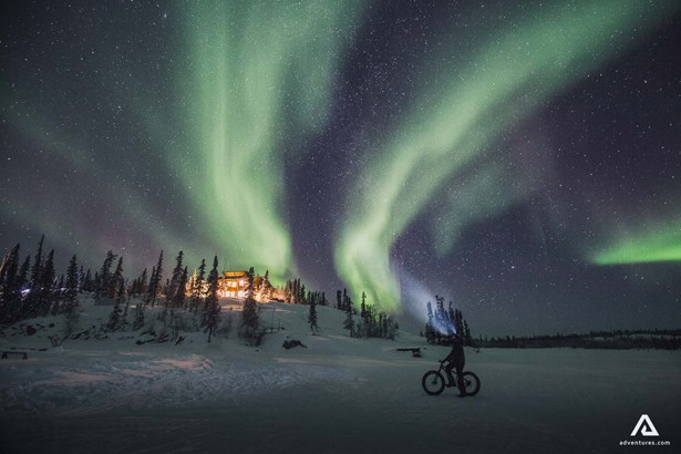 Biking under the Northern lights