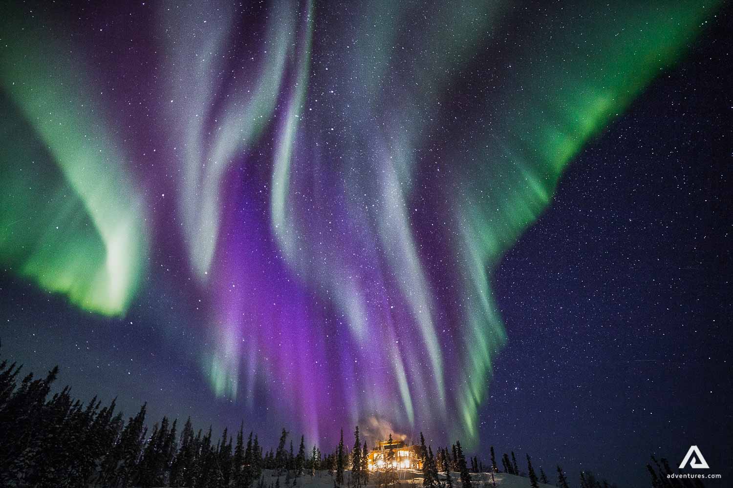 Purple green aurora borealis