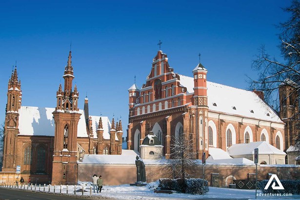 snowy church in winter in vilnius old town