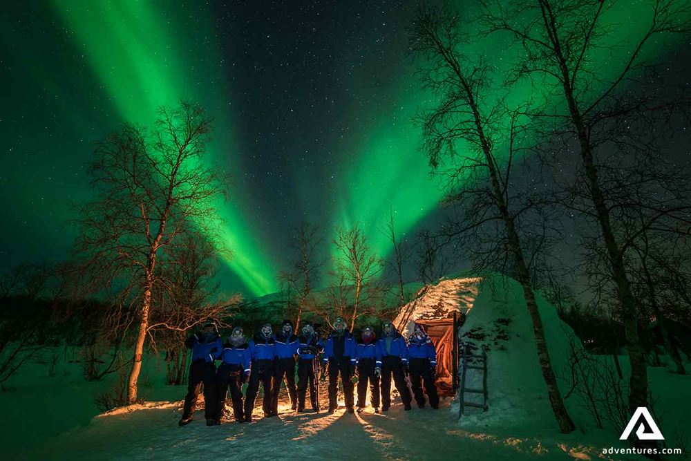group pictures with northern lights