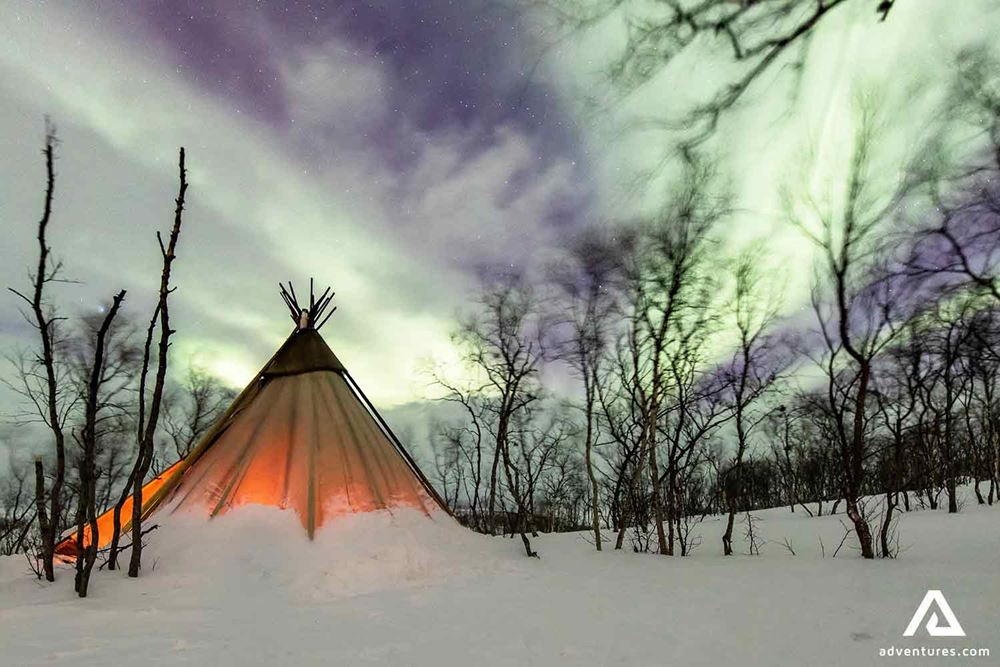 snowed up teepee tent in sweden