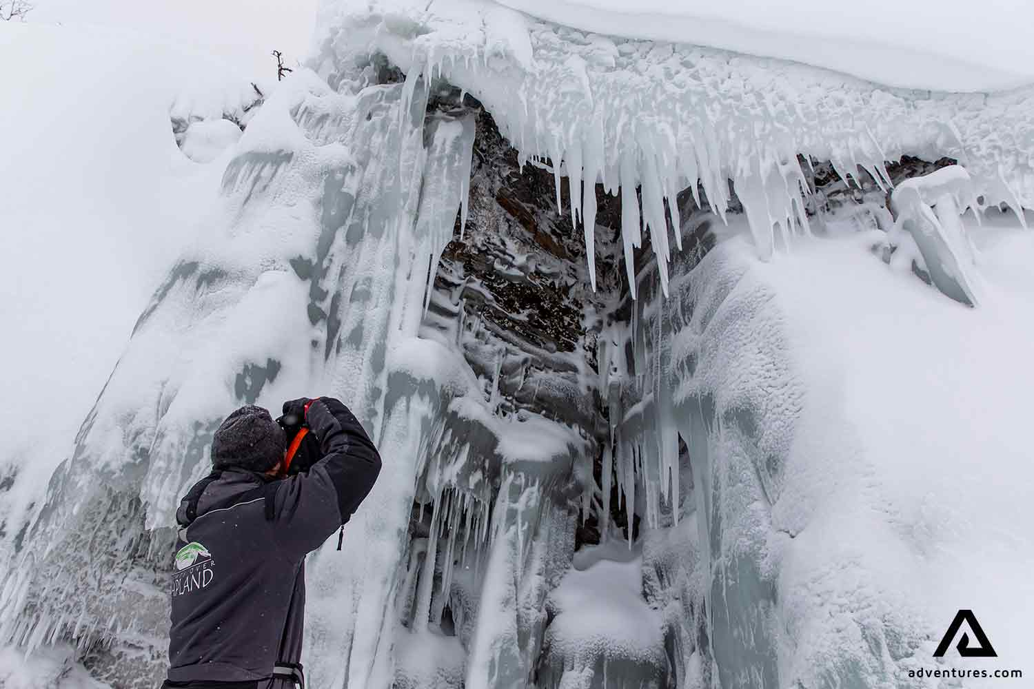 taking picture of icicles in winter