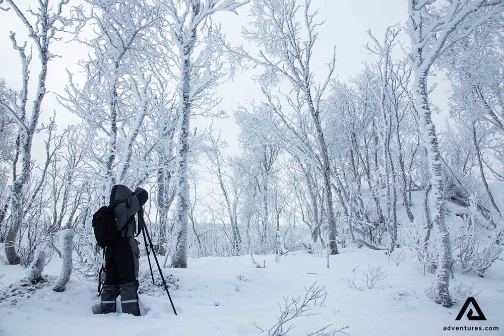 photographer in a snowy field