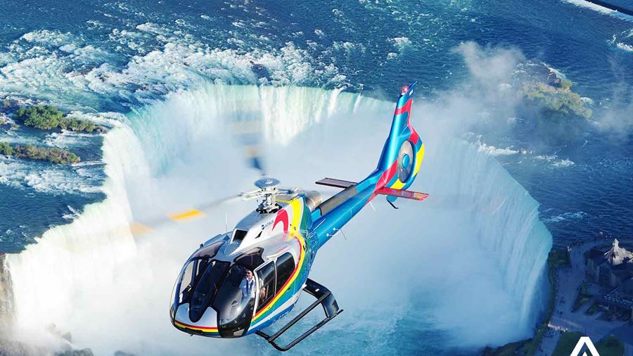 helicopter flying over niagara falls