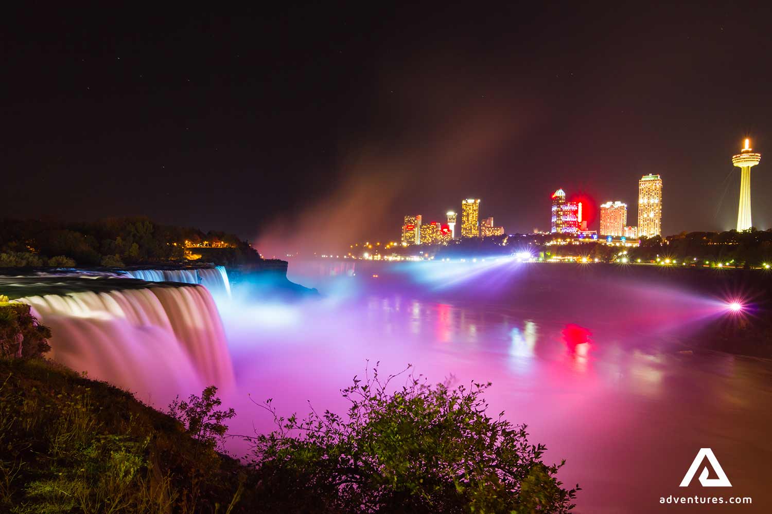 bright night lights at niagara falls in canada