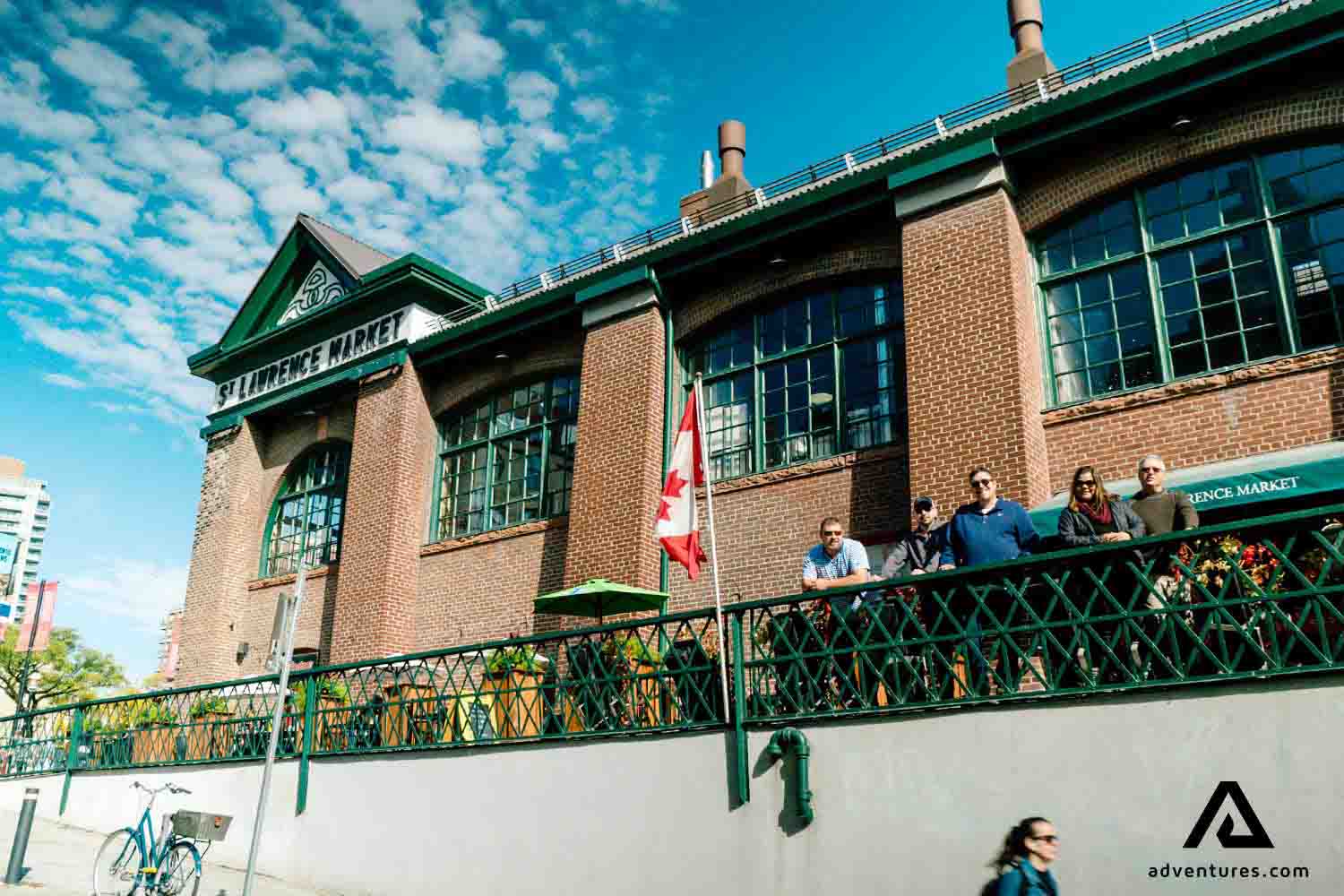 people posing near a building in toronto