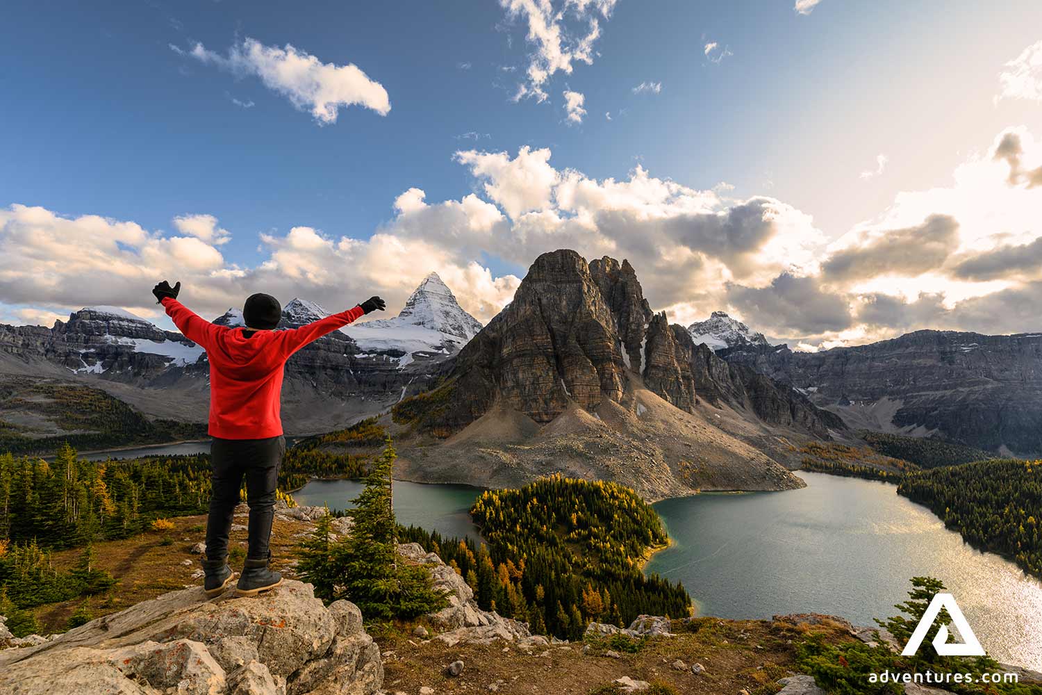 happy man hiking on Assiniboine mountain area