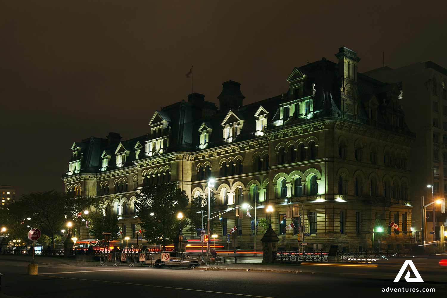 building with night lights in canada