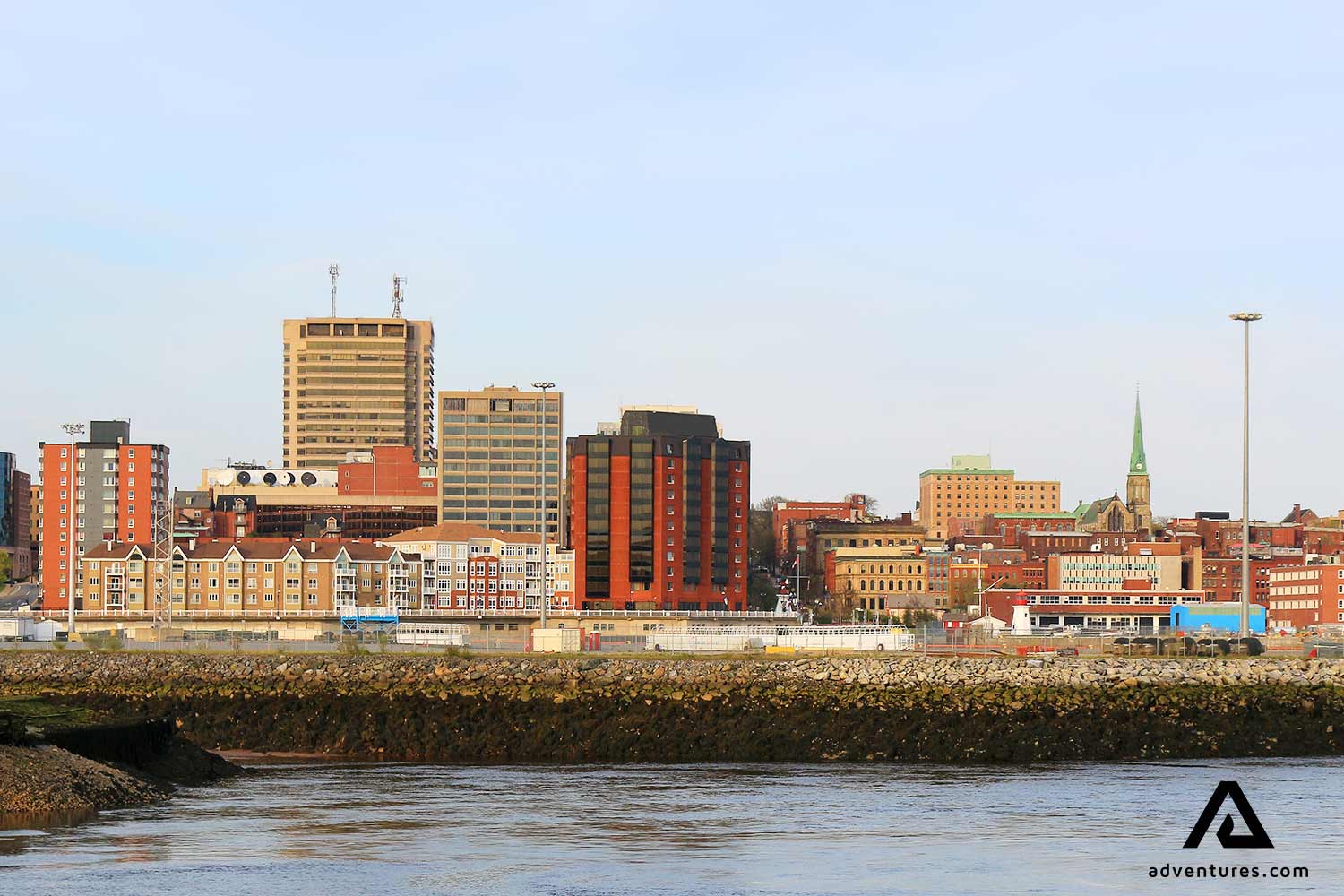buildings near shore in saint john city