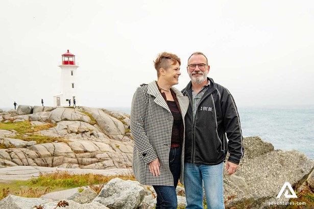 Happy Couple Near Peggy Cove lighthouse