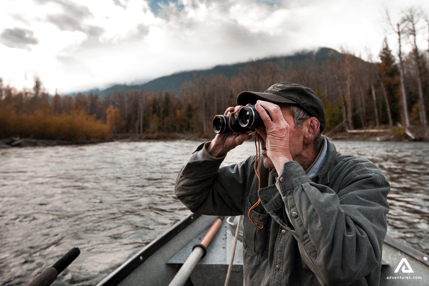 Man exploring a wildlife from a boat