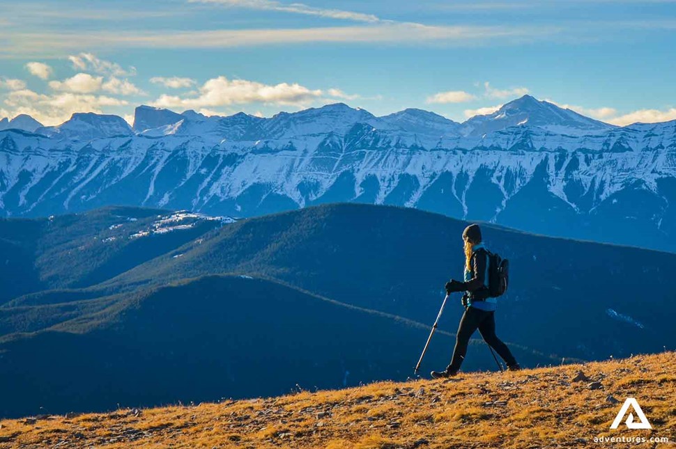 hiking woman with mountains in the background in canada