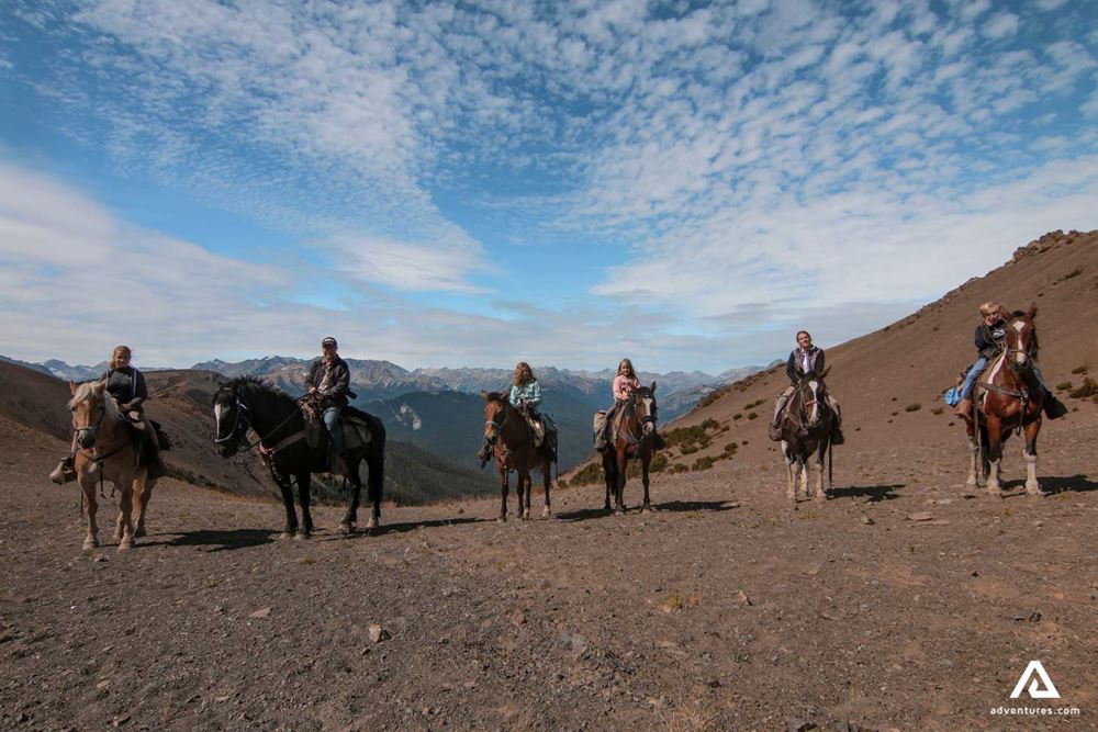 Horseback Riding over Canadian Mountains