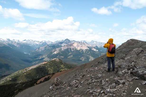 hiker looking at mountain range in canada