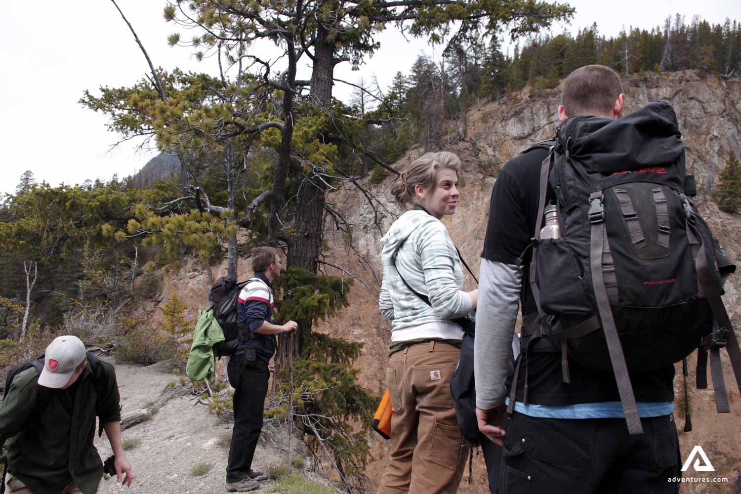 group resting after hiking in canada