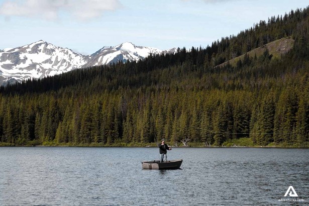 Man fishing from a boat in Canada
