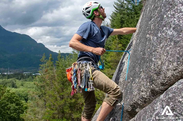 rock climbing and tying up a rope in whistler