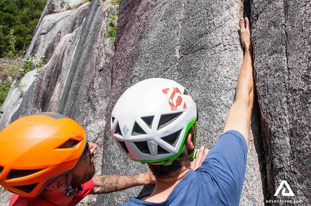 guide explaining rock climbing in whistler