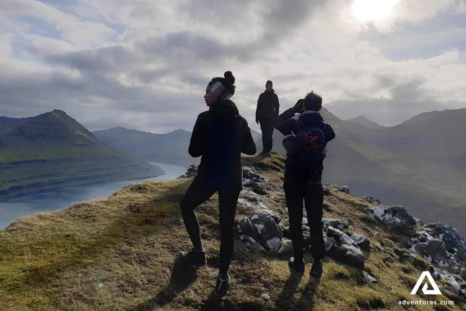 hiking on the mountains of faroe islands in summer