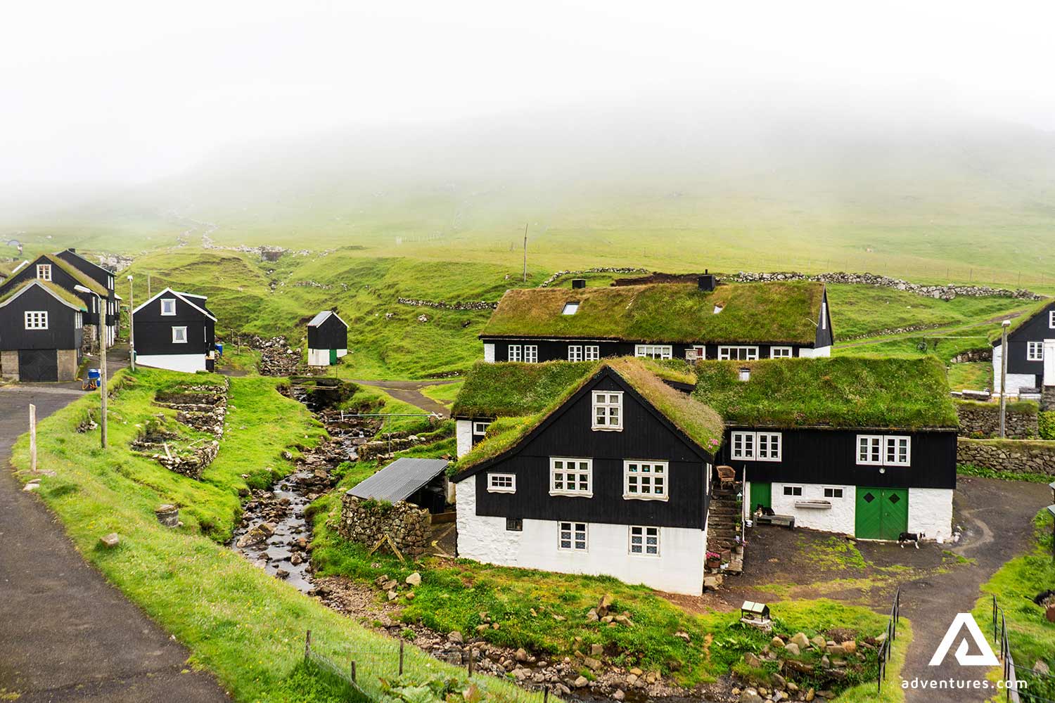 turf houses in mykines village in faroe islands
