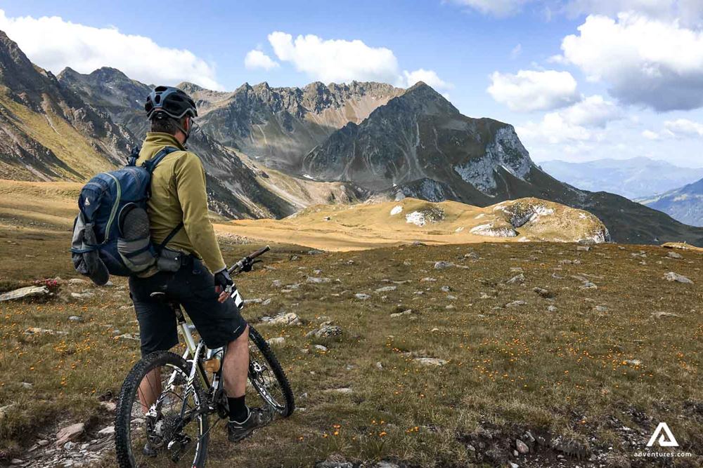 Man on a bike tour in the Canadian mountains