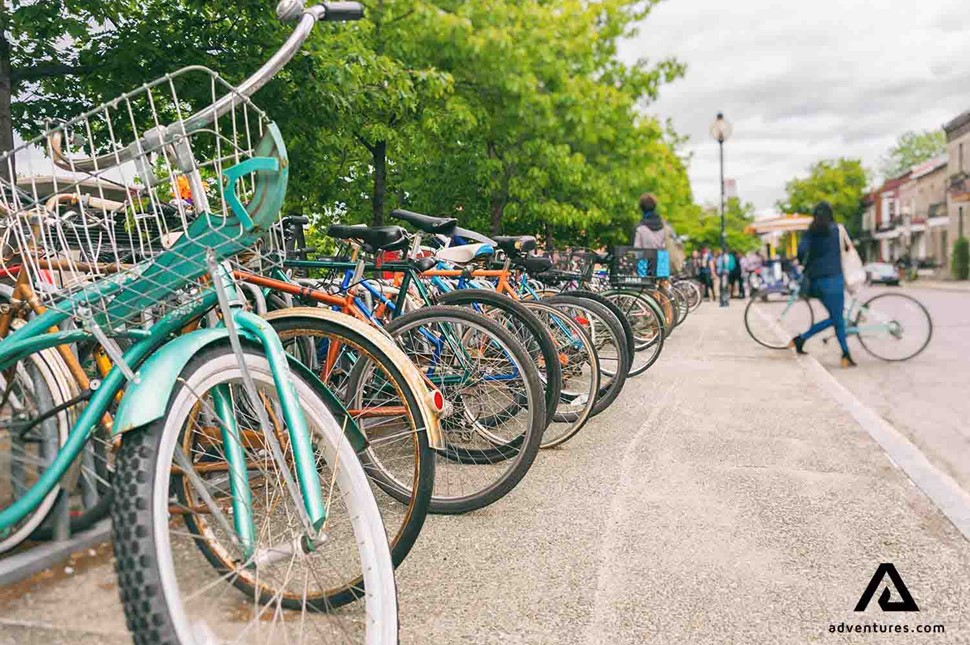 bicycles lined up in montreal city in summer