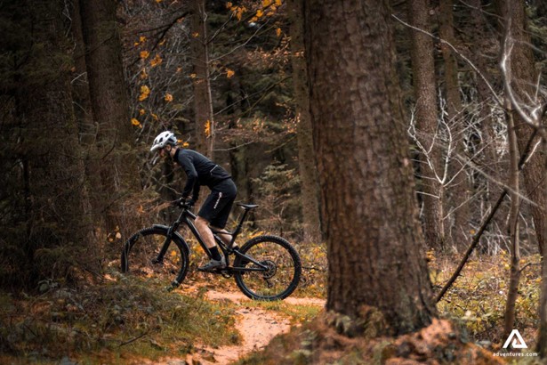 Man cycling in the the forest