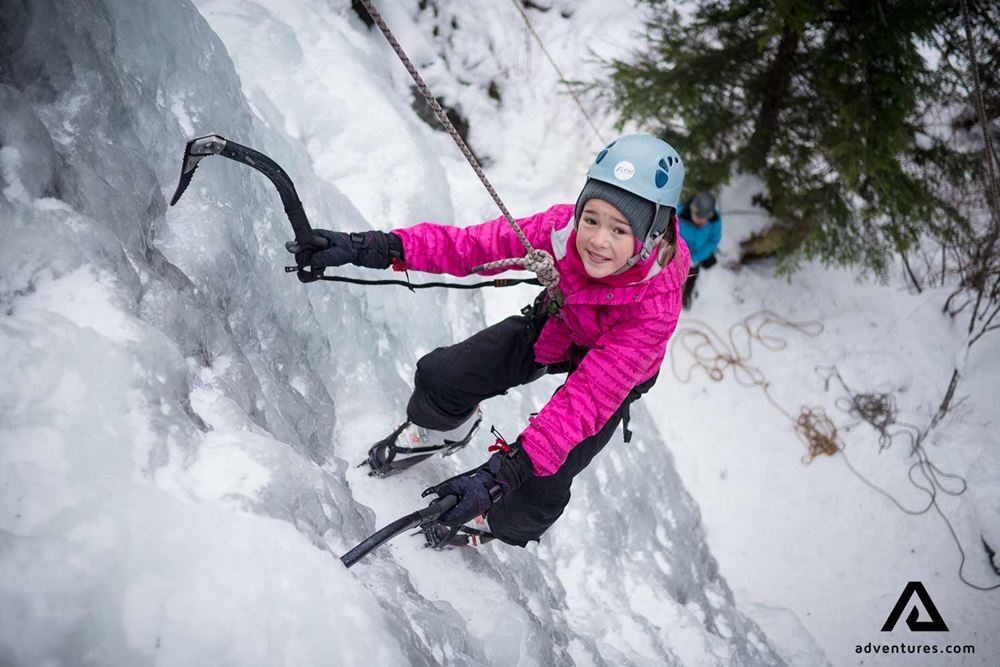 girl ice climbing