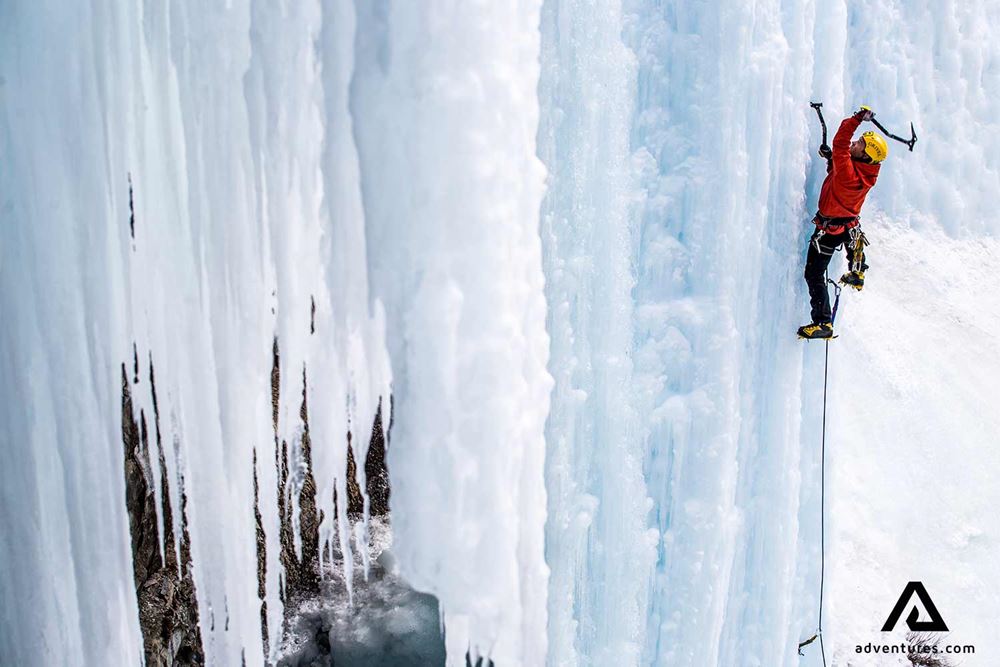 ice climbing a big frozen waterfall