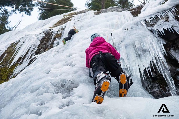 woman ice climbing in canada