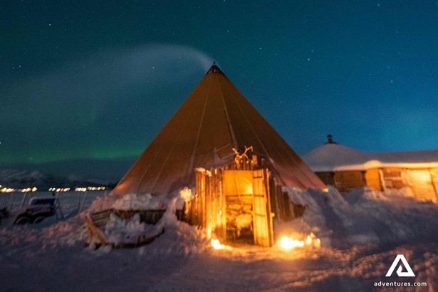 sami tent in winter at night